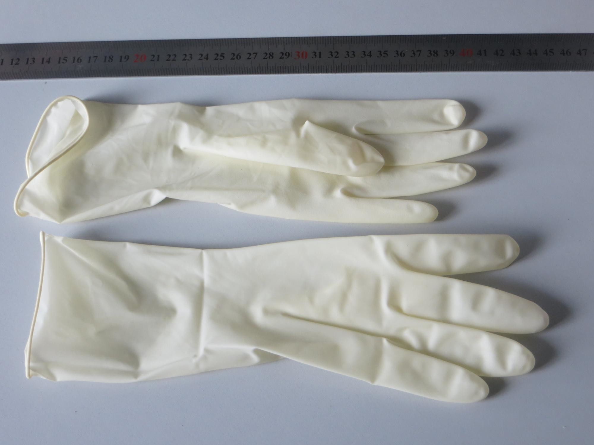 Disposable Latex Gloves/Medical Examination Gloves in China factory